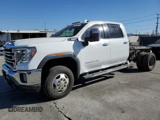 2023 GMC Sierra 3500HD SLT z VIN 1GT49UEY8PF154167, wystawiony jako Copart lot #84495904 z przebiegiem 43 395 mil mil oraz Czysty tytuł • Clean title. Historia ofert i sprzedaży dostępna na DreamBid. Obrazek 1.