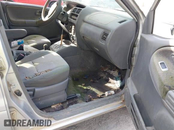 2002 Chevrolet Tracker with VIN 2CNBJ13C126940105, listed as a IAAI auction lot 41805424 with Not provided miles and . Bid and sale history available at DreamBid. Image 5.