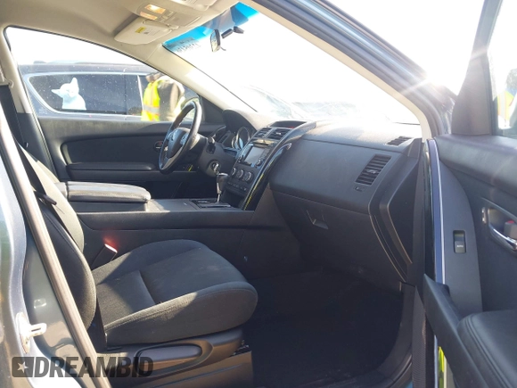 2015 Mazda CX-9 Sport z VIN JM3TB2BAXF0465720, wystawiony jako IAAI lot #42305436 z przebiegiem 130 543 mil mil oraz . Historia ofert i sprzedaży dostępna na DreamBid. Obrazek 5.