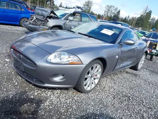 2007 Jaguar XK with VIN SAJWA43B675B17854, listed as a IAAI auction lot 42003478 with 64,149 mi miles. Bid and sale history available at carsss.com. Image 17.