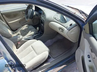 1999 Oldsmobile Alero GL z VIN 1G3NL52TXXC339892, wystawiony jako IAAI lot #41935539 z przebiegiem 315 555 mil mil oraz . Historia ofert i sprzedaży dostępna na DreamBid. Obrazek 5.