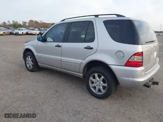 1999 Mercedes-Benz M-Class with VIN 4JGAB72EXXA131890, listed as a IAAI auction lot 41721001 with 168,969 mi miles. Bid and sale history available at carsss.com. Image 3.