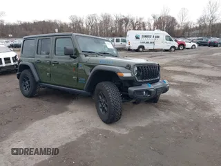2024 Jeep Wrangler Willys z VIN 1C4RJXN64RW163089, wystawiony jako IAAI lot #41145274 z przebiegiem 31 869 mil mil oraz . Historia ofert i sprzedaży dostępna na DreamBid. Obrazek 1.