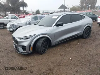 2021 Ford Mustang Mach-E GT z VIN 3FMTK4SE1MME00154, wystawiony jako IAAI lot #41536548 z przebiegiem 19 568 mil mil oraz . Historia ofert i sprzedaży dostępna na DreamBid. Obrazek 2.