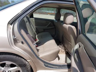 1999 Toyota Camry LE z VIN JT2BF28K9X0201679, wystawiony jako IAAI lot #42037008 z przebiegiem 107 928 mil mil oraz . Historia ofert i sprzedaży dostępna na DreamBid. Obrazek 8.
