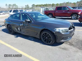 2018 BMW 5 Series 530i z VIN WBAJA5C59JG898805, wystawiony jako IAAI lot #41501565 z przebiegiem 76 144 mil mil oraz . Historia ofert i sprzedaży dostępna na DreamBid. Obrazek 1.