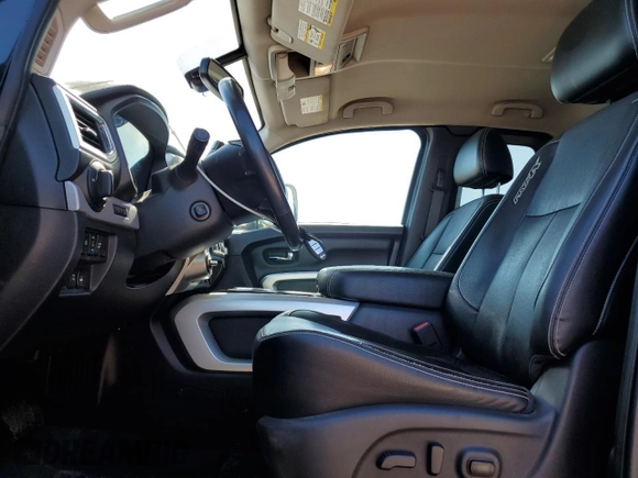 2018 Nissan Titan with VIN 1N6AA1C43JN549358, listed as a Copart auction lot 62417435 with 125,394 mi miles and Salvage title. Bid and sale history available at DreamBid. Image 7.
