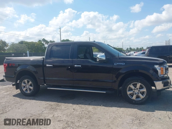 2018 Ford F-150 XL with VIN 1FTEW1EP8JFC77493, listed as a IAAI auction lot 42073382 with Not Provided miles and . Bid and sale history available at carsss.com. Image 12.