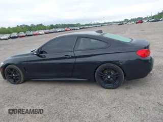 2015 BMW 4 Series 428i with VIN WBA3N3C55FK232319, listed as a IAAI auction lot 42136421 with 140,300 mi miles and . Bid and sale history available at DreamBid. Image 14.