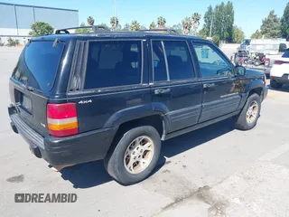 1997 Jeep Grand Cherokee Limited z VIN 1J4GZ78Y3VC683674, wystawiony jako IAAI lot #42331984 z przebiegiem 227 226 mil mil oraz . Historia ofert i sprzedaży dostępna na DreamBid. Obrazek 4.