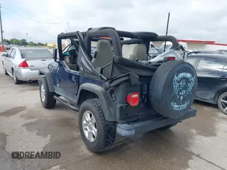 2006 Jeep Wrangler SE with VIN 1J4FA29156P739521, listed as a IAAI auction lot 42563566 with 117,281 mi miles and . Bid and sale history available at DreamBid. Image 3.