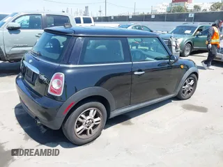 2013 MINI Cooper Hardtop with VIN WMWSU3C51DT691451, listed as a IAAI auction lot 42087943 with 132,570 mi miles. Bid and sale history available at carsss.com. Image 4.