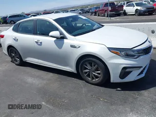 2019 Kia Optima LX with VIN 5XXGT4L30KG335926, listed as a IAAI auction lot 41986835 with 114,309 mi miles. Bid and sale history available at carsss.com. Image 1.