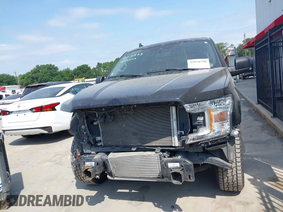2019 Ford F-150 XL with VIN 1FTEW1CP3KKF31901, listed as a IAAI auction lot 42030790 with 73,771 mi miles and . Bid and sale history available at DreamBid. Image 13.