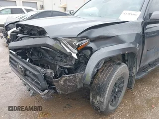 2022 Toyota Tacoma SR5 with VIN 3TMAZ5CN9NM195132, listed as a IAAI auction lot 42383482 with 51,011 mi miles and . Bid and sale history available at DreamBid. Image 6.