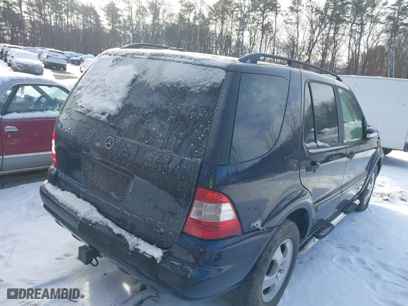 2003 Mercedes-Benz M-Class 3.7L with VIN 4JGAB57E33A421704, listed as a IAAI auction lot 41404597 with 192,078 mi miles. Bid and sale history available at carsss.com. Image 4.