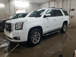 2016 GMC Yukon SLT with VIN 1GKS1BKCXGR330005, listed as a Copart auction lot 49391345 with 165,709 mi miles and Salvage Title. Bid and sale history available at carsss.com. Image 1.