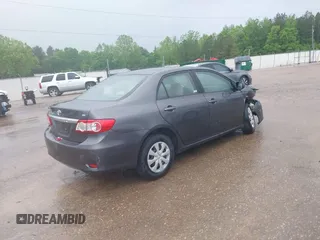 2011 Toyota Corolla L with VIN JTDBU4EE3B9140115, listed as a IAAI auction lot 42052792 with 143,646 mi miles and . Bid and sale history available at DreamBid. Image 4.