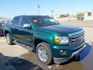 2015 GMC Canyon 2WD SLT with VIN 1GTG5CE31F1142283, listed as a IAAI auction lot 42373705 with 130,123 mi miles and . Bid and sale history available at DreamBid. Image 1.