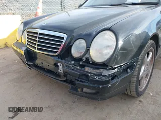 2001 Mercedes-Benz E-Class with VIN WDBJH65JX1B290284, listed as a IAAI auction lot 41713265 with 1 mi miles. Bid and sale history available at carsss.com. Image 6.