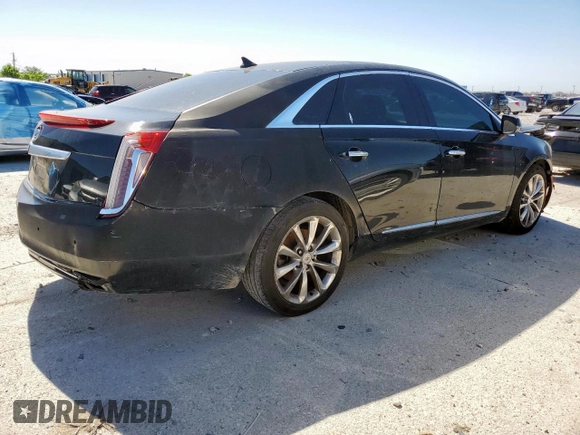 2014 Cadillac XTS Luxury z VIN 2G61M5S39E9302853, wystawiony jako Copart lot #57712215 z przebiegiem 180 886 mil mil oraz Czysty tytuł • Clean title. Historia ofert i sprzedaży dostępna na DreamBid. Obrazek 3.