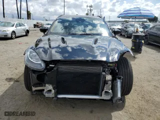 2021 Aston Martin DBX with VIN SCFVUJAW7MTV03341, listed as a Copart auction lot 71015804 with 12,324 mi miles and Salvage Title. Bid and sale history available at carsss.com. Image 5.
