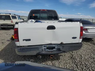 2003 Ford F-150 XL with VIN 1FTRX18L03NA96484, listed as a Copart auction lot 50834755 with 242,836 mi miles and Salvage title. Bid and sale history available at DreamBid. Image 6.