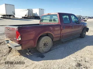 2000 Ford F-350 XL with VIN 1FTSW30F6YEB89796, listed as a Copart auction lot 67490144 with 517,242 mi miles and Salvage Title. Bid and sale history available at DreamBid. Image 3.