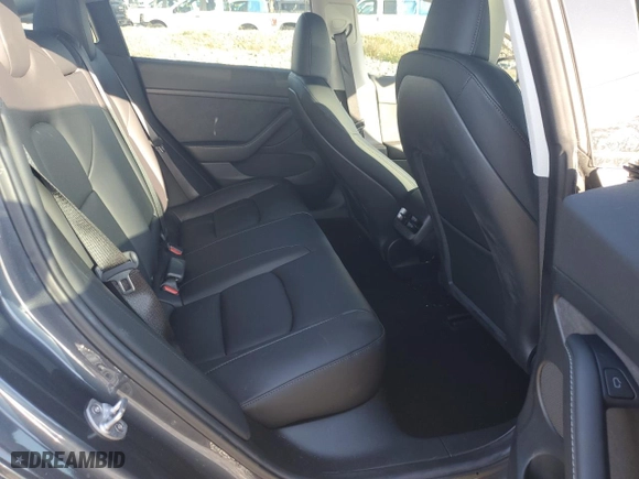2023 Tesla Model 3 with VIN 5YJ3E1EAXPF704742, listed as a Copart auction lot 86323624 with 4,401 mi miles and Salvage Title. Bid and sale history available at carsss.com. Image 10.