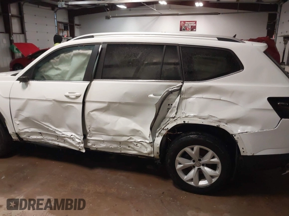2019 Volkswagen Atlas SE with VIN 1V2LR2CA8KC577216, listed as a IAAI auction lot 41156460 with 68,382 mi miles and . Bid and sale history available at DreamBid. Image 6.