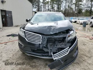 2015 Lincoln MKC z VIN 5LMTJ2AH6FUJ14928, wystawiony jako Copart lot #51453185 z przebiegiem 80 852 mil mil oraz Szkody całkowita. Historia ofert i sprzedaży dostępna na DreamBid. Obrazek 5.