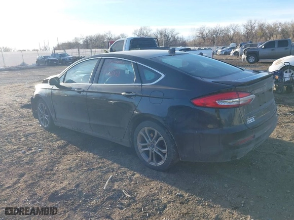 2020 Ford Fusion Hybrid Titanium with VIN 3FA6P0RU9LR141476, listed as a IAAI auction lot 41472921 with 84,433 mi miles. Bid and sale history available at carsss.com. Image 3.