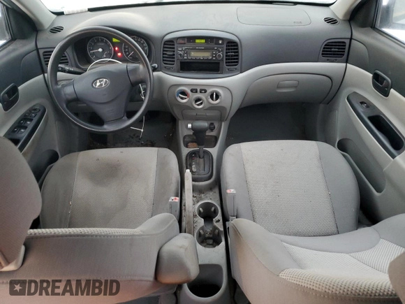 2007 Hyundai Accent GL z VIN KMHCN45CX7U127037, wystawiony jako Copart lot #86041984 z przebiegiem 212 828 mil mil oraz Szkoda całkowita • Salvage title. Historia ofert i sprzedaży dostępna na DreamBid. Obrazek 8.