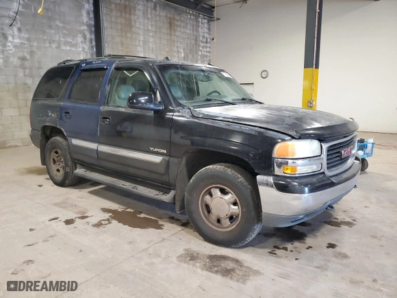 2003 GMC Yukon SLT with VIN 1GKEK13Z63J304047, listed as a Copart auction lot 77318644 with 252,484 mi miles and Salvage Title. Bid and sale history available at carsss.com. Image 4.