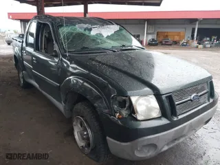 2003 Ford Explorer Sport Trac XLS with VIN 1FMZU77E73UB07352, listed as a IAAI auction lot 41803900 with 153,433 mi miles. Bid and sale history available at carsss.com. Image 1.
