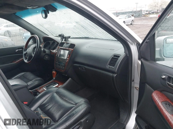 2003 Acura MDX Touring Pkg w/Navigation System with VIN 2HNYD18863H525646, listed as a IAAI auction lot 41951543 with 167,289 mi miles. Bid and sale history available at carsss.com. Image 5.