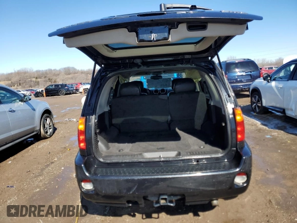 2008 GMC Envoy Denali with VIN 1GKET63M282161131, listed as a Copart auction lot 48054005 with 89,704 mi miles and Salvage Title. Bid and sale history available at carsss.com. Image 6.