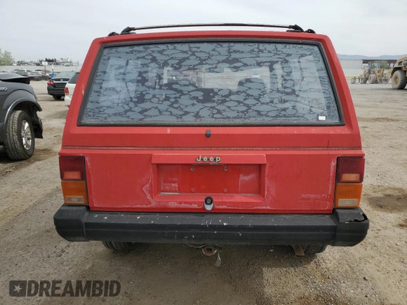 1993 Jeep Cherokee SE with VIN 1J4FT27P2PL619945, listed as a Copart auction lot 59053465 with 222,336 mi miles and Clean title. Bid and sale history available at DreamBid. Image 6.