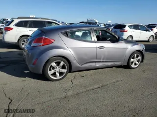 2014 Hyundai Veloster with VIN KMHTC6AD4EU193239, listed as a Copart auction lot 81298294 with 75,740 mi miles and Salvage Title. Bid and sale history available at carsss.com. Image 3.