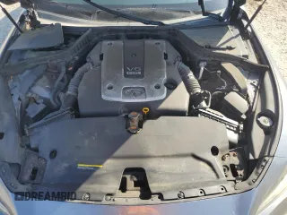 2014 Infiniti Q50 z VIN JN1BV7AR5EM704360, wystawiony jako Copart lot #54883795 z przebiegiem 156 301 mil mil oraz Szkoda całkowita • Salvage title. Historia ofert i sprzedaży dostępna na DreamBid. Obrazek 11.
