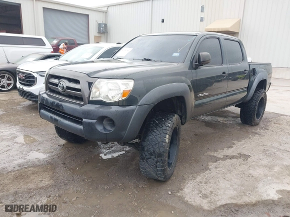 2009 Toyota Tacoma with VIN 3TMLU42N89M032318, listed as a IAAI auction lot 41990701 with 248,947 mi miles. Bid and sale history available at carsss.com. Image 17.