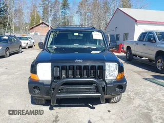 2006 Jeep Commander with VIN 1J8HG48K56C204031, listed as a IAAI auction lot 42034851 with 213,665 mi miles. Bid and sale history available at carsss.com. Image 13.