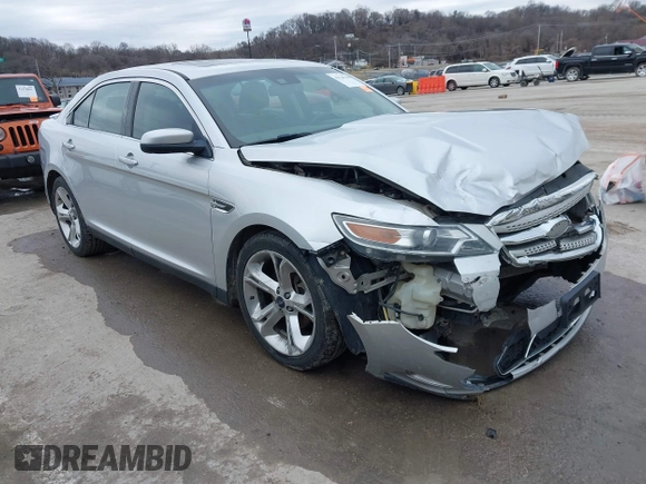 2012 Ford Taurus SHO z VIN 1FAHP2KT6CG142954, wystawiony jako IAAI lot #41526760 z przebiegiem 187 887 mil mil oraz . Historia ofert i sprzedaży dostępna na DreamBid. Obrazek 1.