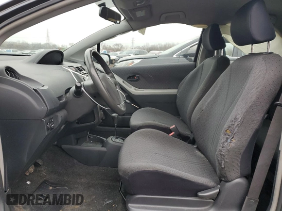 2011 Toyota Yaris with VIN JTDJT4K37B5339113, listed as a Copart auction lot 82474554 with 148,800 mi miles and Salvage Title. Bid and sale history available at carsss.com. Image 7.