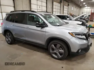 2021 Honda Passport Touring with VIN 5FNYF8H92MB016307, listed as a Copart auction lot 53087325 with 77,126 mi miles and Salvage Title. Bid and sale history available at carsss.com. Image 4.