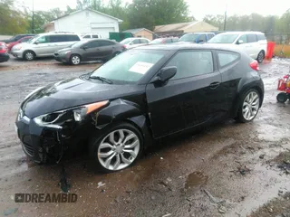 2012 Hyundai Veloster w/Gray Int with VIN KMHTC6AD2CU024382, listed as a IAAI auction lot 41980192 with 46,684 mi miles and . Bid and sale history available at DreamBid. Image 2.