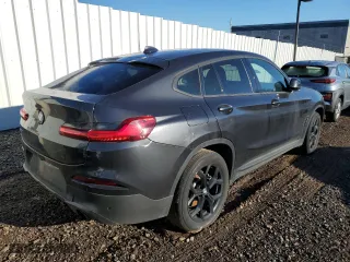 2020 BMW X4 xDrive30i with VIN 5UX2V1C02LLE67937, listed as a Copart auction lot 70302802 with 30,553 mi miles. Bid and sale history available at carsss.com. Image 3.