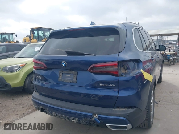 2020 BMW X5 sDrive40i with VIN 5UXCR4C07L9C27998, listed as a IAAI auction lot 41652088 with 59,009 mi miles and . Bid and sale history available at DreamBid. Image 6.