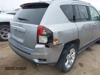 2016 Jeep Compass Sport with VIN 1C4NJDBB8GD780146, listed as a IAAI auction lot 41792416 with 127,548 mi miles. Bid and sale history available at carsss.com. Image 6.