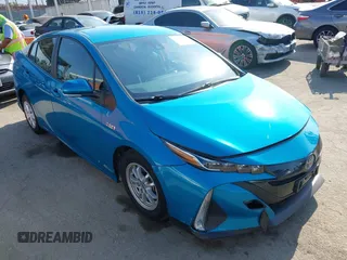 2022 Toyota Prius LE with VIN JTDKAMFP8N3209977, listed as a IAAI auction lot 42777763 with 52,995 mi miles and . Bid and sale history available at DreamBid. Image 1.